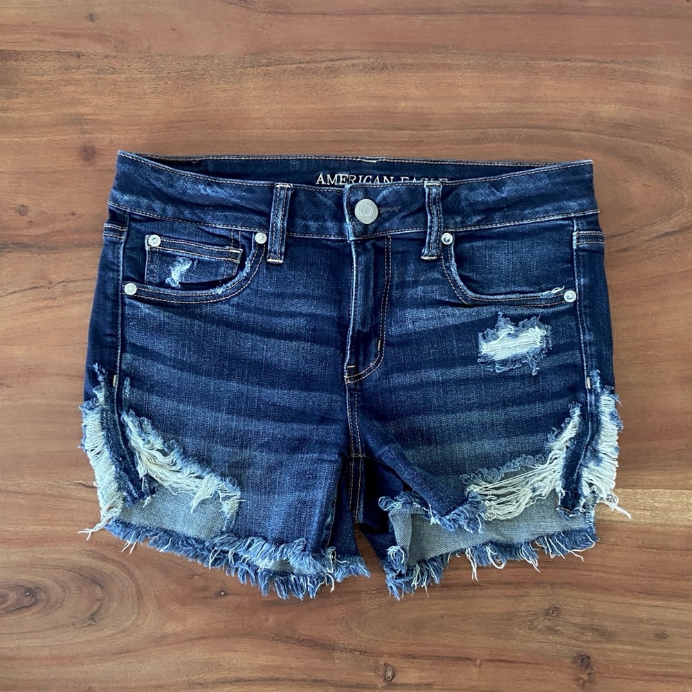 American Eagle stretch denim midi jean shorts distressed medium blue size 10